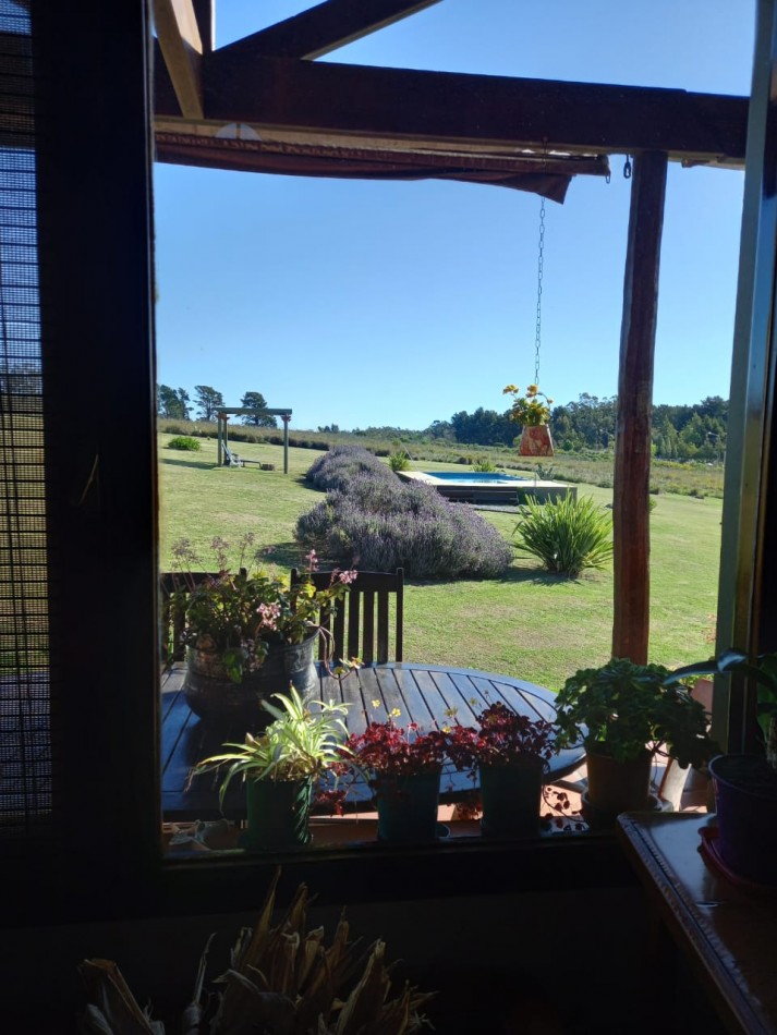 HERMOSISIMA FRACCION EN TANDIL,PARAJE LA ELENA, CON DOS CABANAS Y PISCINA