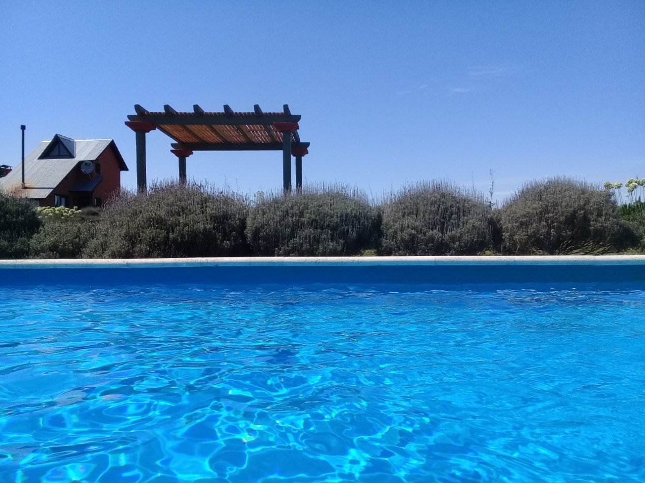 HERMOSISIMA FRACCION EN TANDIL,PARAJE LA ELENA, CON DOS CABANAS Y PISCINA